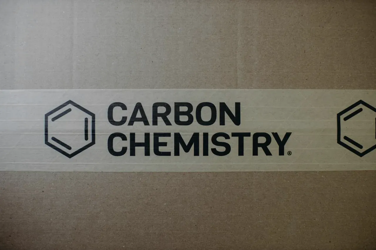 Carbon Chemistry tape across a carton