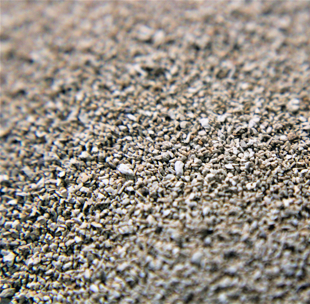 Close up shot of a gray/tan granular media.